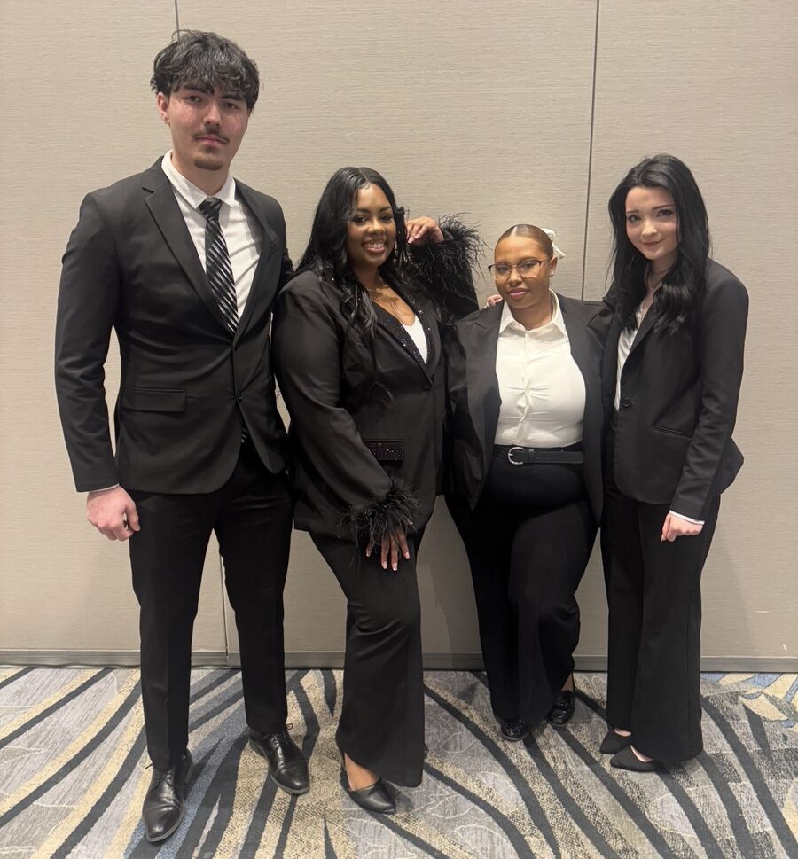 Zenith Glow Inc. team members in professional attire