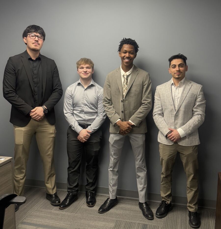 Zenith Glow Inc. team members in professional attire
