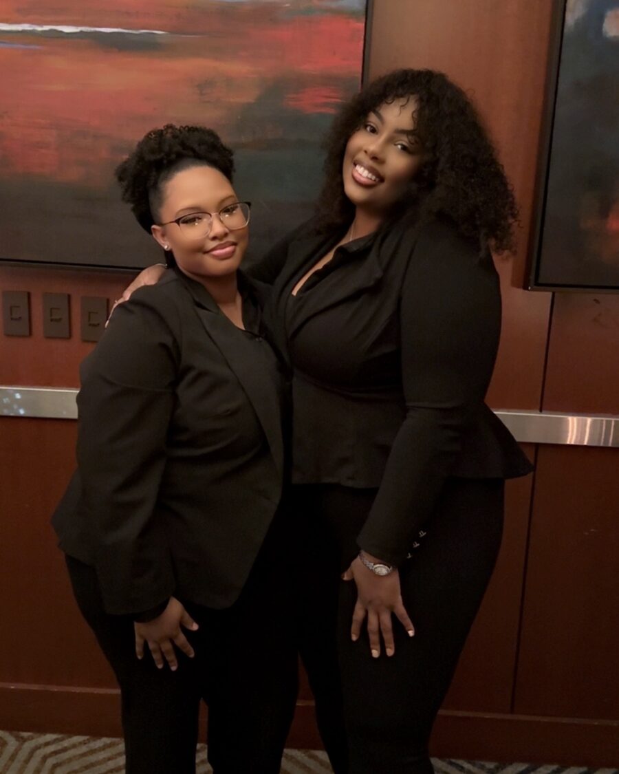 Two Zenith Glow team members at a company event