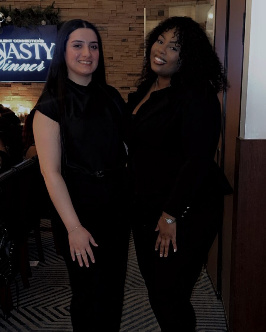 Two Zenith Glow team members at an awards dinner